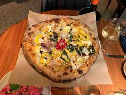 Luminosa signature dishes Wood-Fired PizzaSeasonal RisottoHouse-made Pasta